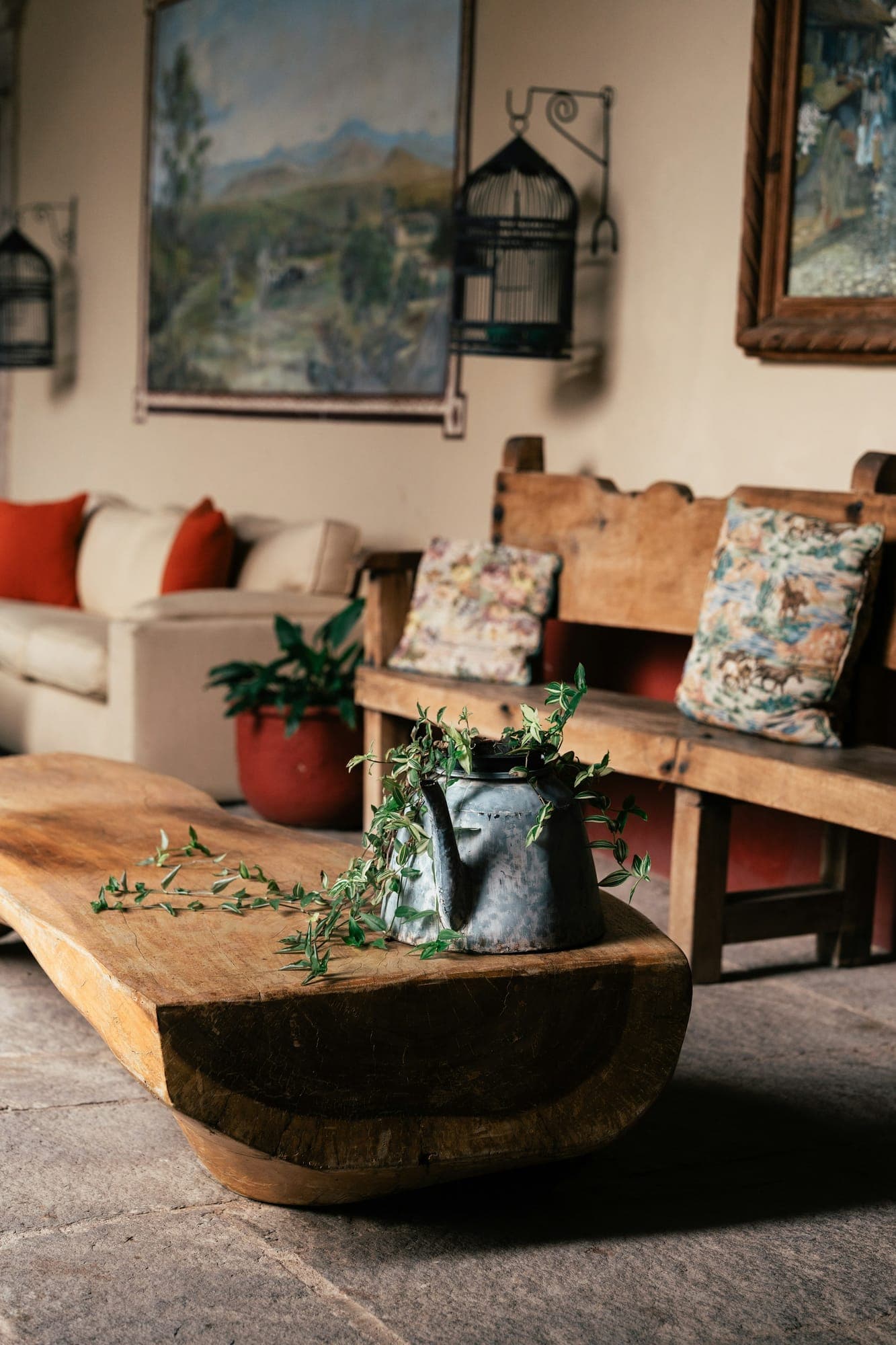 A coffee table hewn from a single thick slab, on a low solid base